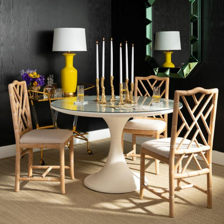 Hayden Fretwork Chairs styled around white tulip table
