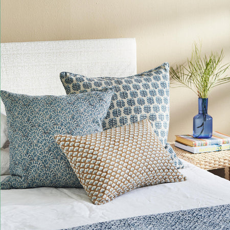 Hera Azure Pillow Cover styled on bed