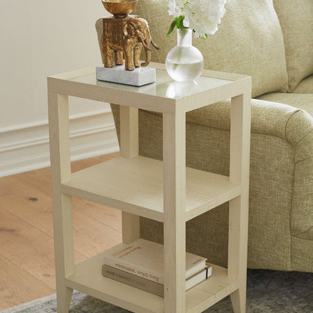 Isabella Cream Grasscloth Side Table next to sofa