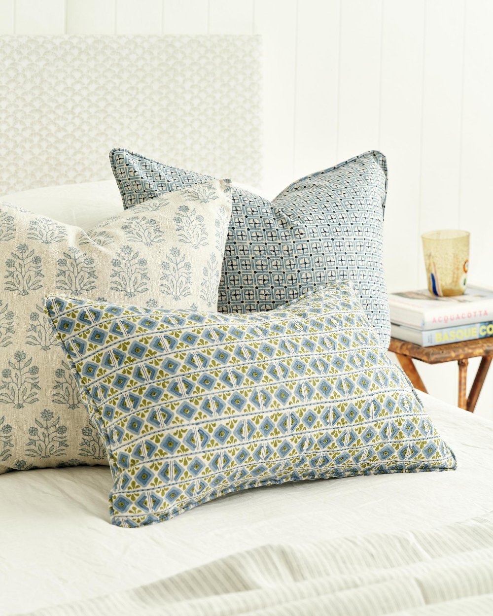 Ishtar Moss Azure Lumbar Pillow Cover on bed