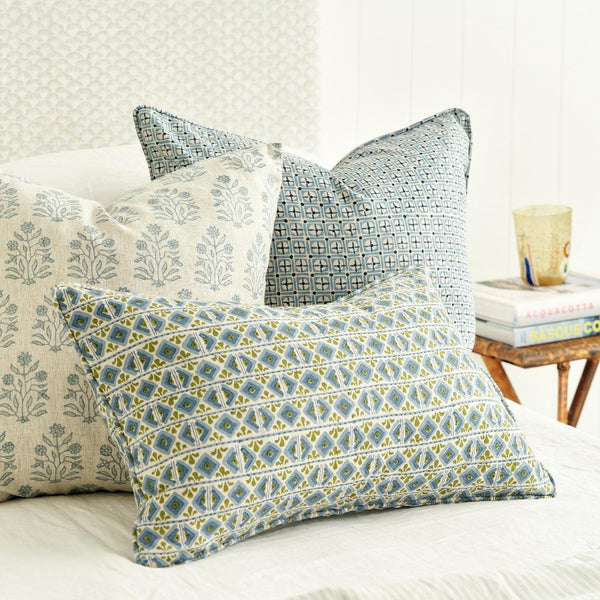 Ishtar Moss Azure Lumbar Pillow Cover on bed