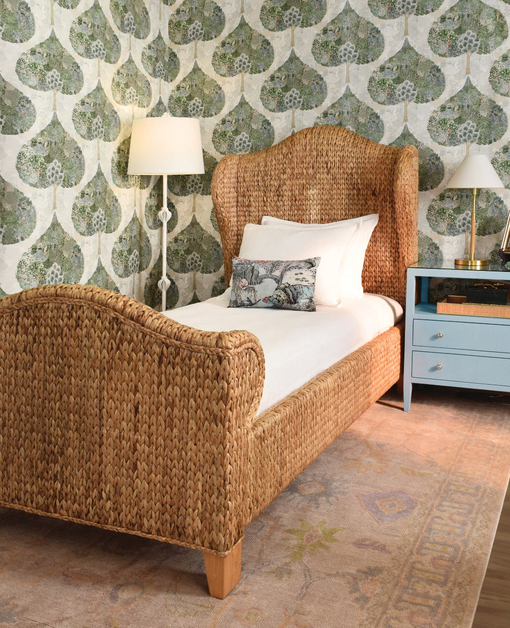 Jarrett Woven Water Hyacinth Bed styled in bedroom with wallpaper
