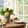 Koi Fish Vase with hydrangeas on breakfast table - Dear Keaton