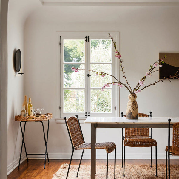 Lacoste Wicker Side Chairs styled in dining room