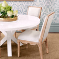 Lancaster Oak Chairs around round white dining table