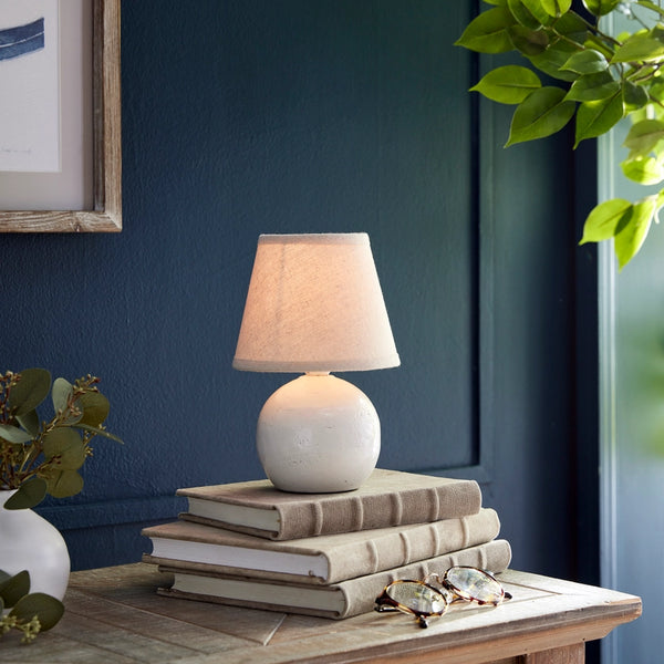 Landry Mini Lamp on book stack