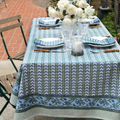 Larisa Napkins and block print tablecloth in garden setting