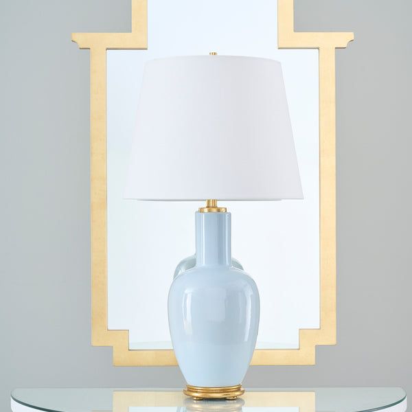 Leighton Sky Table Lamp in front of gold mirror