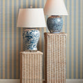 Leona Blue and White Aviary Table Lamp and Hannah Floral Vine Table Lamp styled on pedestals