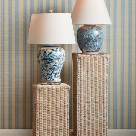 Leona Blue and White Aviary Table Lamp and Hannah Floral Vine Table Lamp styled on pedestals