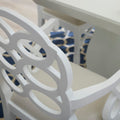 Loop white lacquer arm chair closeup