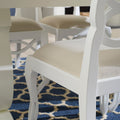 Loop white lacquer dining chair closeup styled