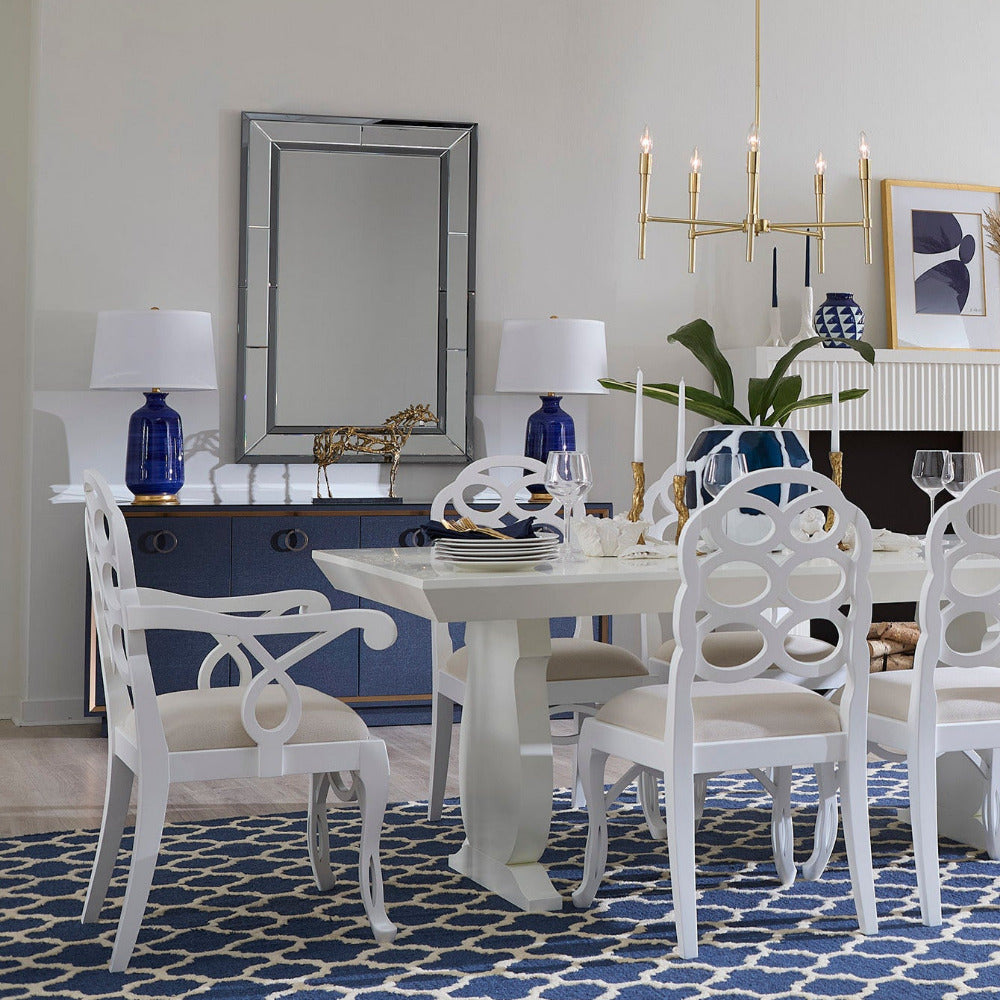 Loop white lacquer dining chairs styled in dining room 