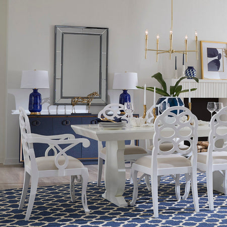 Loop white lacquer dining chairs styled in dining room 