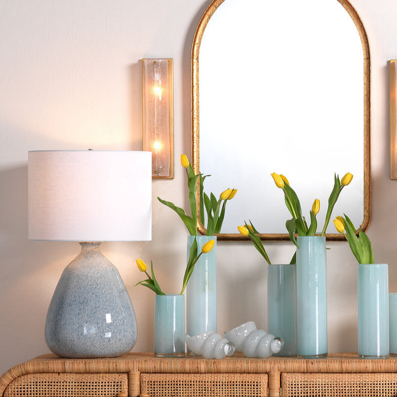 Lucie Table Lamp - Reactive Blue Glaze styled on console