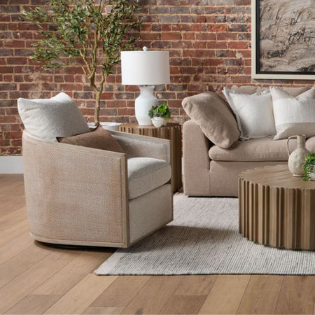 Mansfield Oatmeal Swivel Club Chair styled in brick loft space