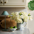 Marbled Ocean Pitcher styled in kitchen with white flowers