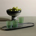 Marina Green and White Stripe Tumbler Glasses on marble tray