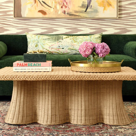 Marley Scalloped Rattan Coffee Table styled with green velvet sofa