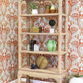 Ming Style Woven Rattan Etagere styled in colorful corner