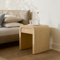 Montecito Raffia Waterfall Side Table in bedroom