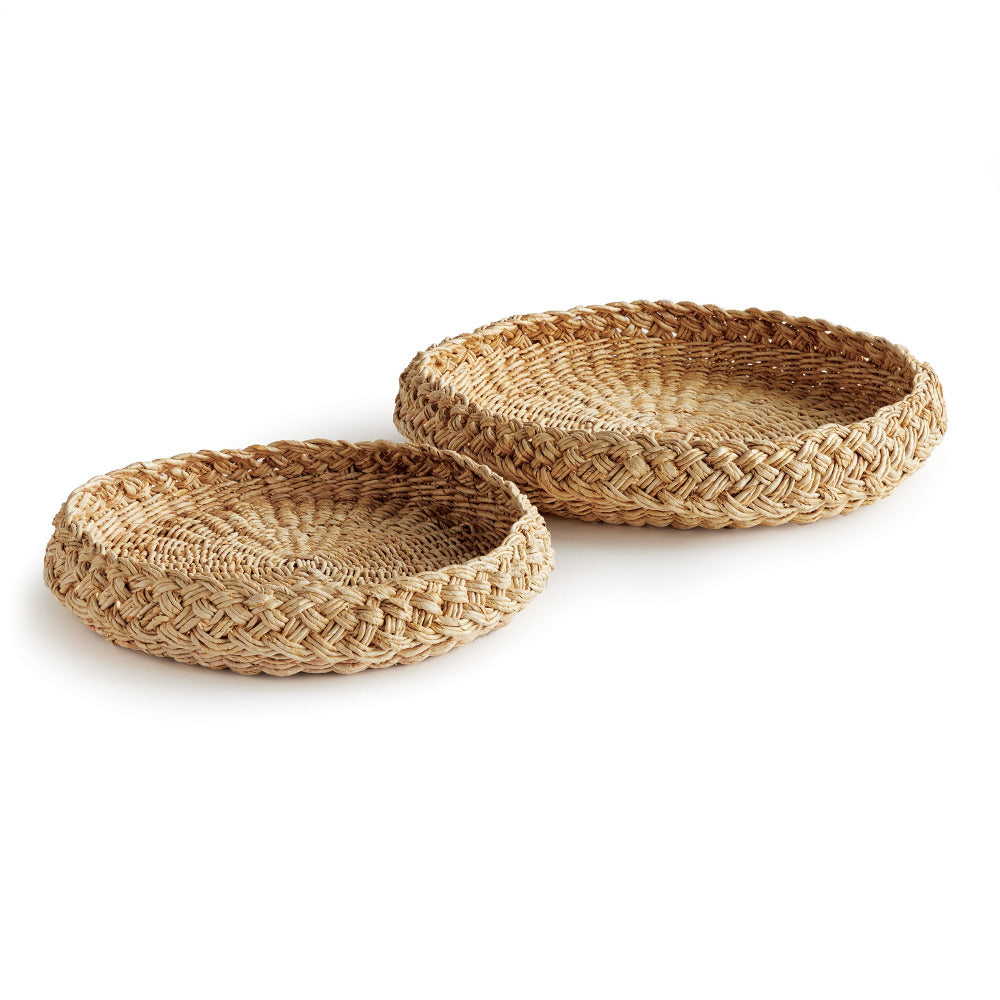 Two woven baskets on a white background