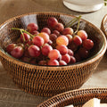 Mandalay Warm Brown Rattan Serving Bowl with red grapes