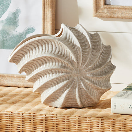 Nautilus Shell Vase on wicker console