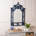 Pagoda Navy Blue Lacquer Mirror styled above dresser