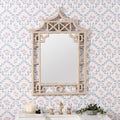 Pagoda Sand Lacquer Mirror styled in wallpapered bathroom