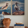 Pair of Seagulls on Canvas styled above bamboo console table