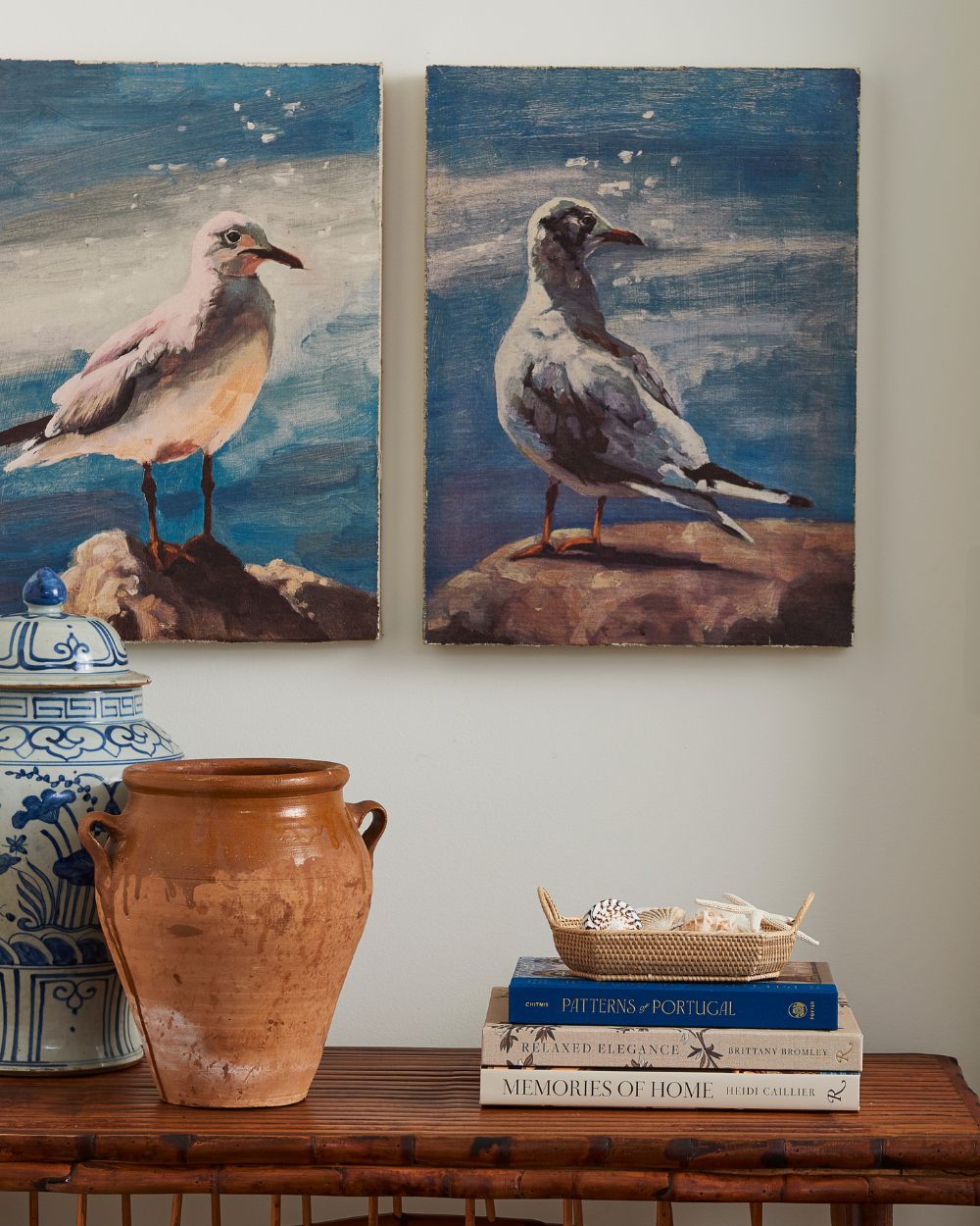 Pair of Seagulls on Canvas styled above bamboo console table