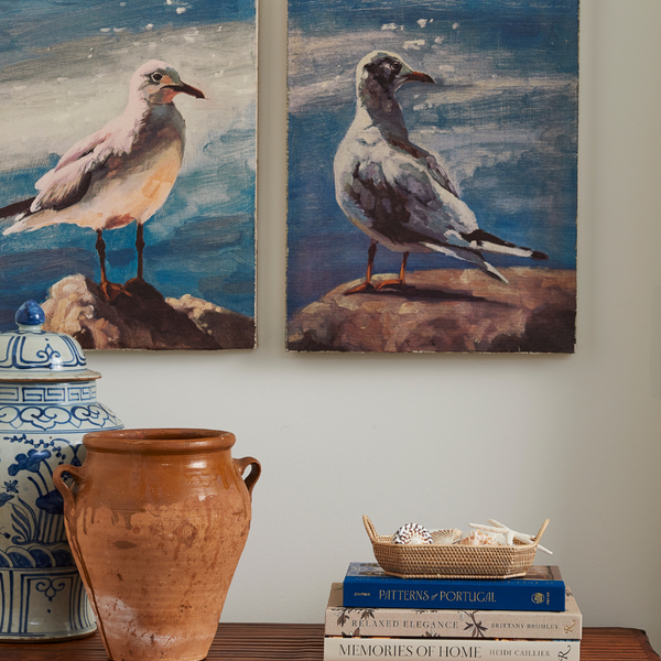 Pair of Seagulls on Canvas styled above bamboo console table