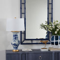 Pavillion Chinoiserie Lamp Styled with gold piper on navy grasscloth dresser