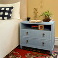 Porter Light Blue Nightstand in bedroom with red rug