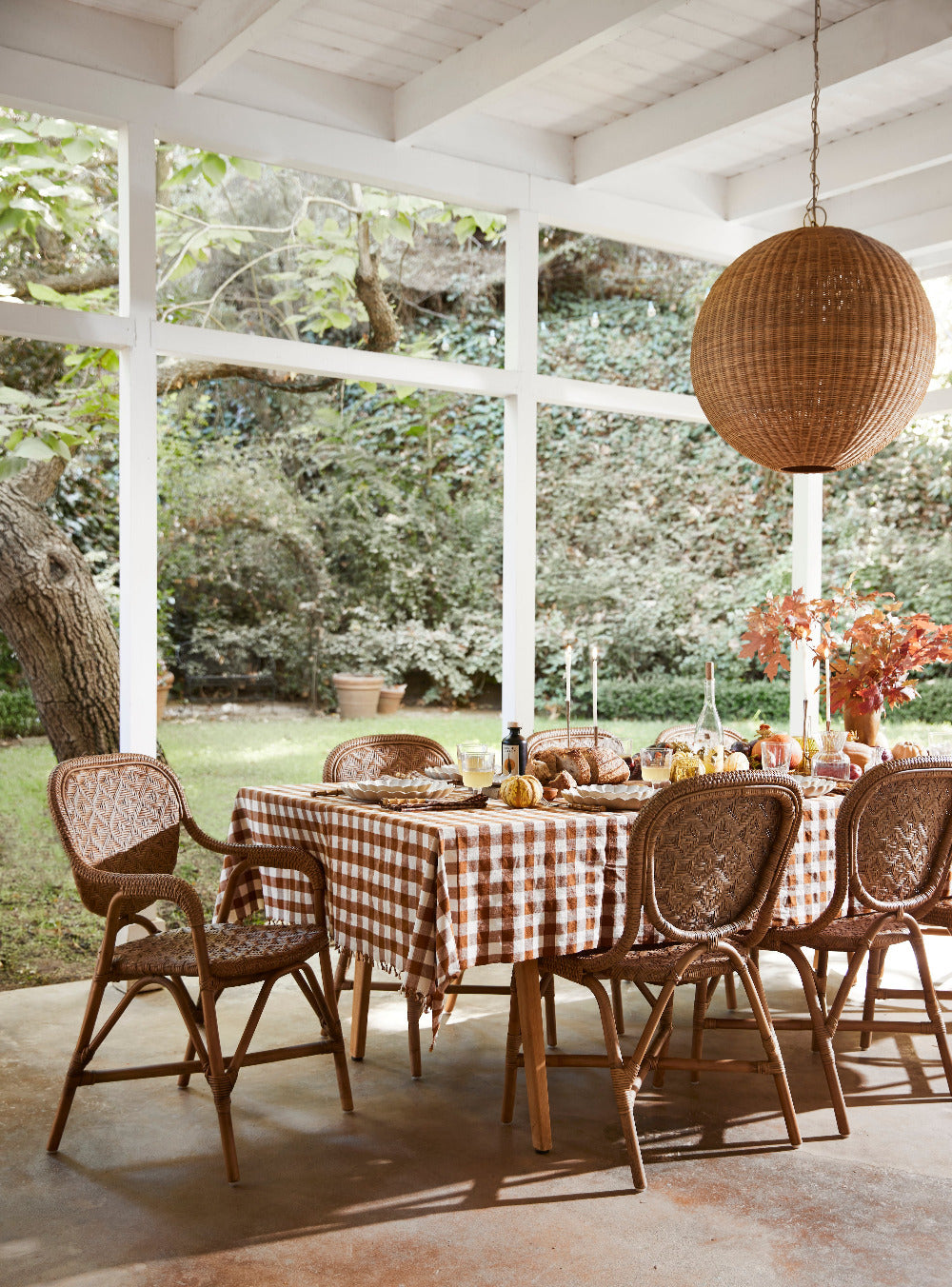 Portofino Antique Brown Rattan Chairs styled on porch