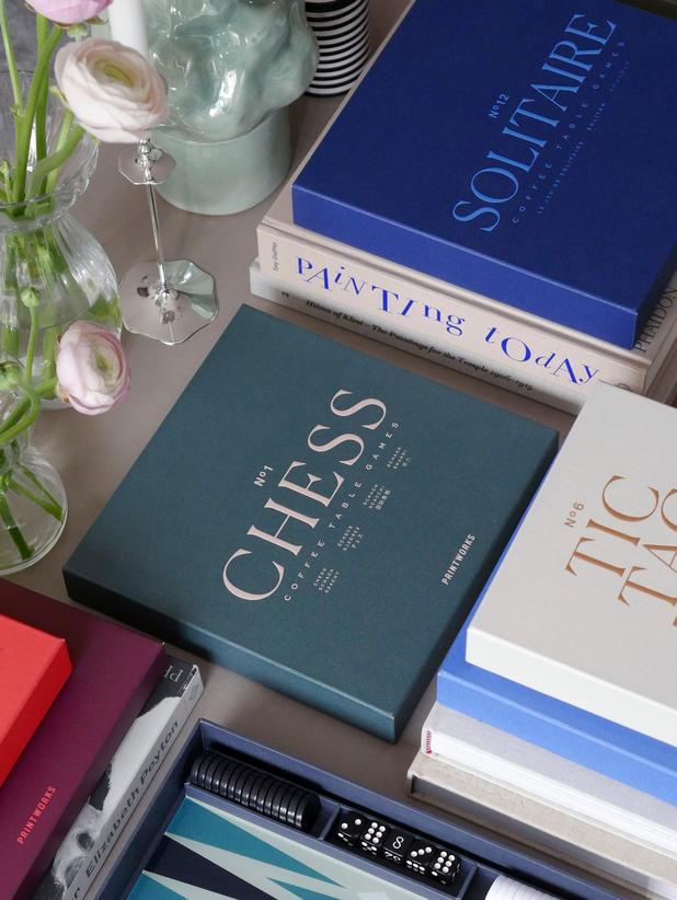 Classic Chess boxed game on coffee table