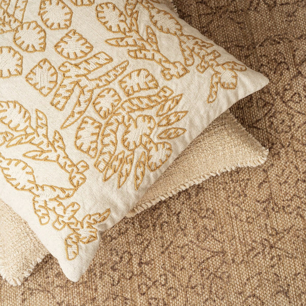 Raina Embroidered Pillow Styled on Floor