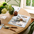 Raj Blue Placemats and Napkins styled with bamboo salad servers 