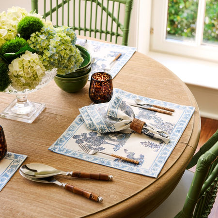 Raj Blue Placemats and Napkins styled with bamboo salad servers 