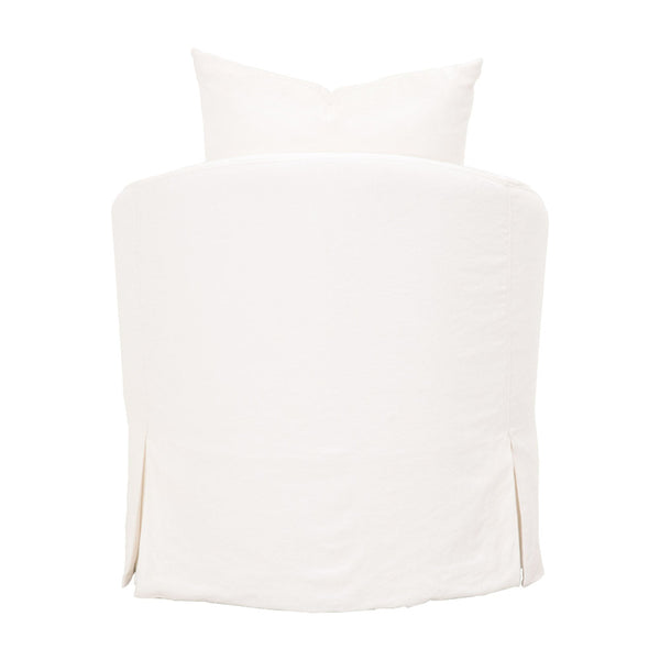 White upholstered bed chair or chair cover with two pillows visible.