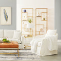 Resnick Cream Slipcover Swivel Club Chair styled in living room