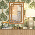 Rhodes Natural Rattan Greek Key Wall Mirror styled in wallpapered room