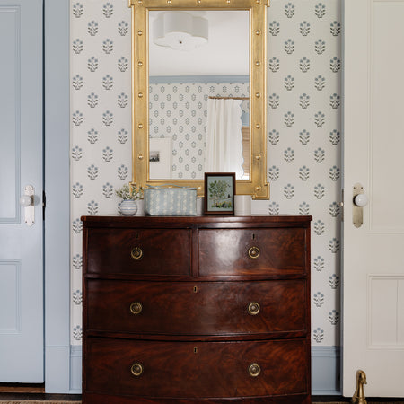 Rivet Gold Wall Mirror above dresser in bedroom