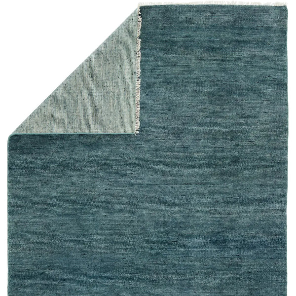 Sanditon Pearl Blue Rug with folded corner