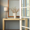 Sanibel Natural Raffia Console styled in entry