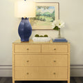 Saxon Undyed Grasscloth Chest styled with blue lamp