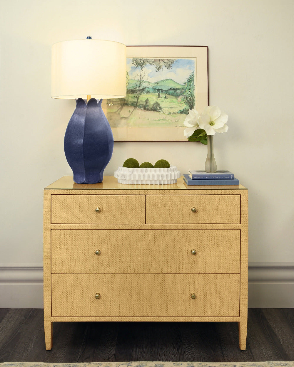 Saxon Undyed Grasscloth Chest styled with blue lamp