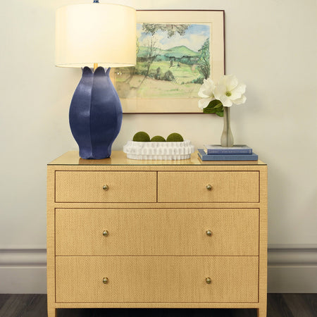 Saxon Undyed Grasscloth Chest styled with blue lamp