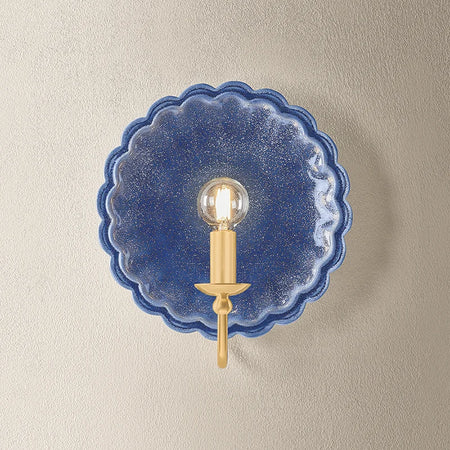 Scalloped Edge Pierce Denim Wall Sconce illuminated